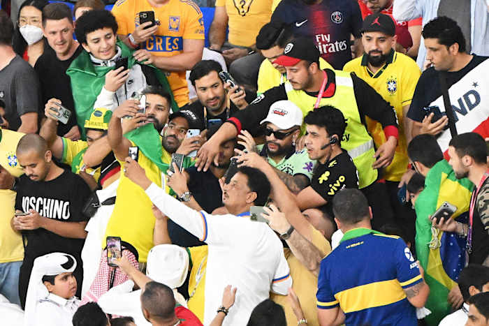 Fans at Stadium 974 pictured taking photographs of a Neymar lookalike in the crowd during Brazil's 1-0 win over Switzerland at the 2022 World Cup in Qatar